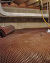 Crawl space drainage matting installed in a home in Beverly