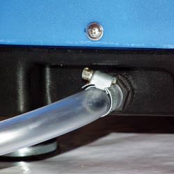 A self-draining crawl space dehumidifier connected to a sump pump system in Peabody