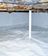 A sealed crawl space in Framingham with a vapor barrier