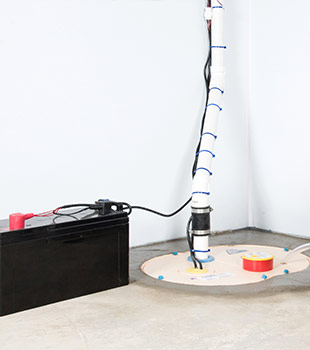 A sump pump installed in Revere by Basement Systems