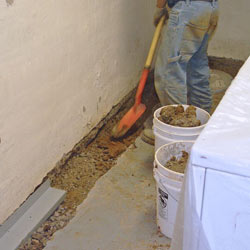 Digging a trench for a French Drain system in Boston