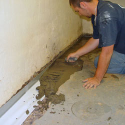 Testing a French drain system in a Medford home.