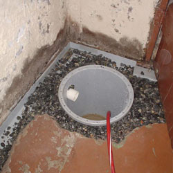 Installing a sump in a sump pump liner in a Cambridge home
