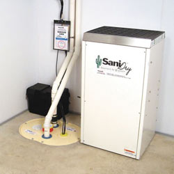 Sump pump system, dehumidifier, and basement wall panels installed during a sump pump installation in Methuen