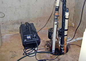 Pedestal sump pump system installed in a home in Arlington