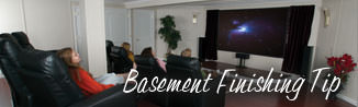 a waterproofed basement that has been finished into a family room in Lawrence