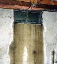 Flooding through basement windows in a Billerica home.