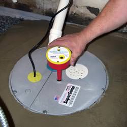 A newly installed sump pump system in a basement in Watertown