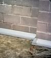 Our baseboard drain system installed on a corner in a Haverhill basement.