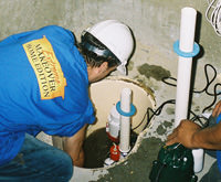 installing a sump pump and backup sump pump system in Melrose, MA