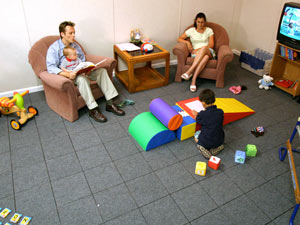 Waterproof basement flooring installed in a family room in Waltham, Massachusetts