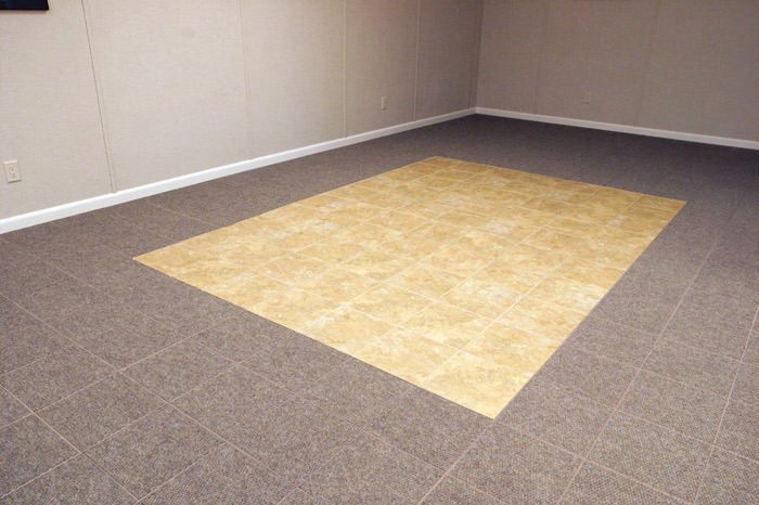 tiled and carpeted basement flooring installed in a Lynn home