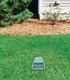 A buried gutter drain downspout extension installed in a Billerica home