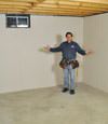 Framingham basement insulation covered by EverLast™ wall paneling, with SilverGlo™ insulation underneath