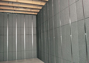 SilverGlo™ insulation and metal studs making up our Basement to Beautiful panels.  Installed in Somerville.