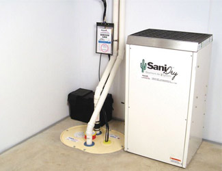 a complete basement waterproofing system installed in a Lowell home